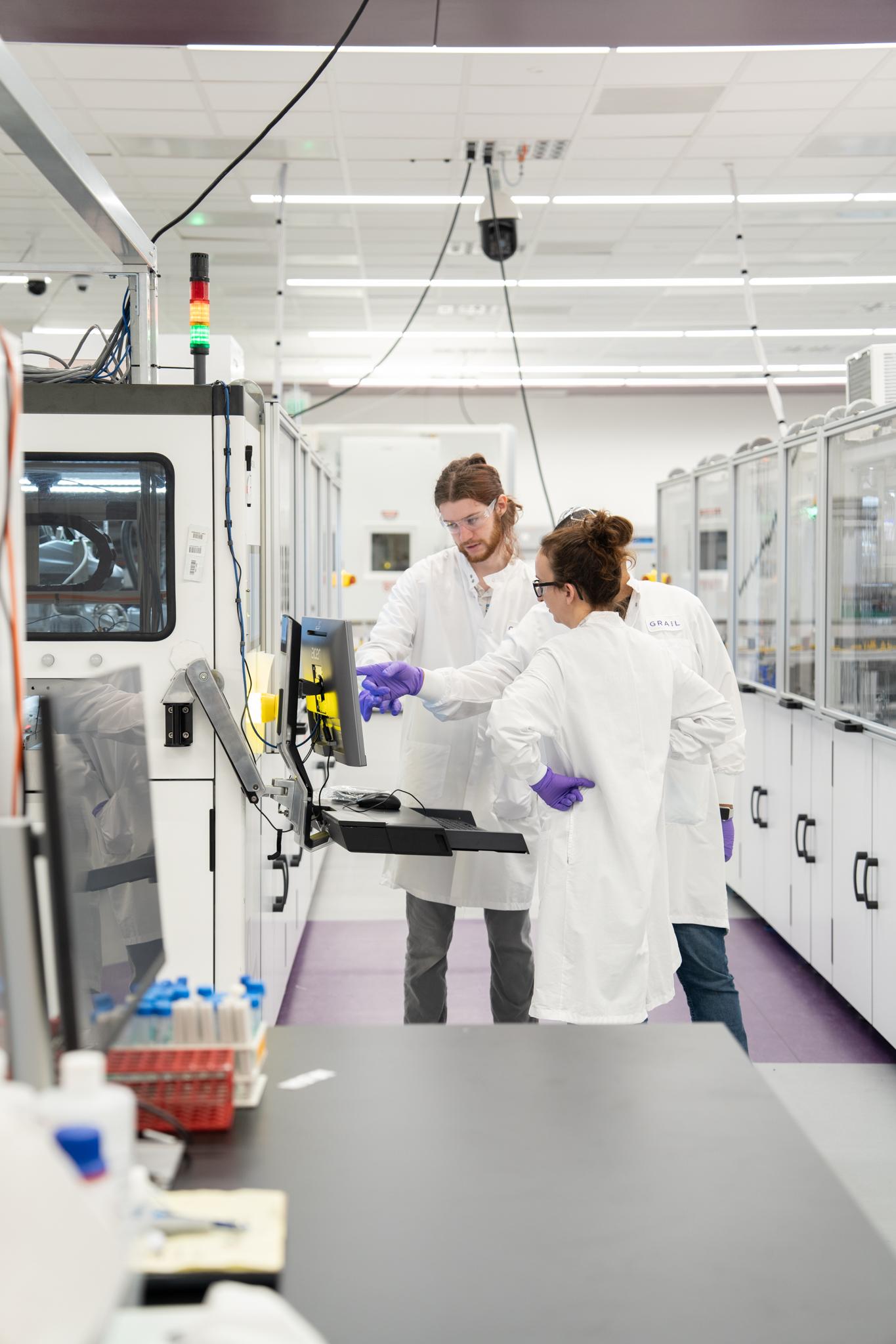 GRAIL laboratory scientists working with testing equipment